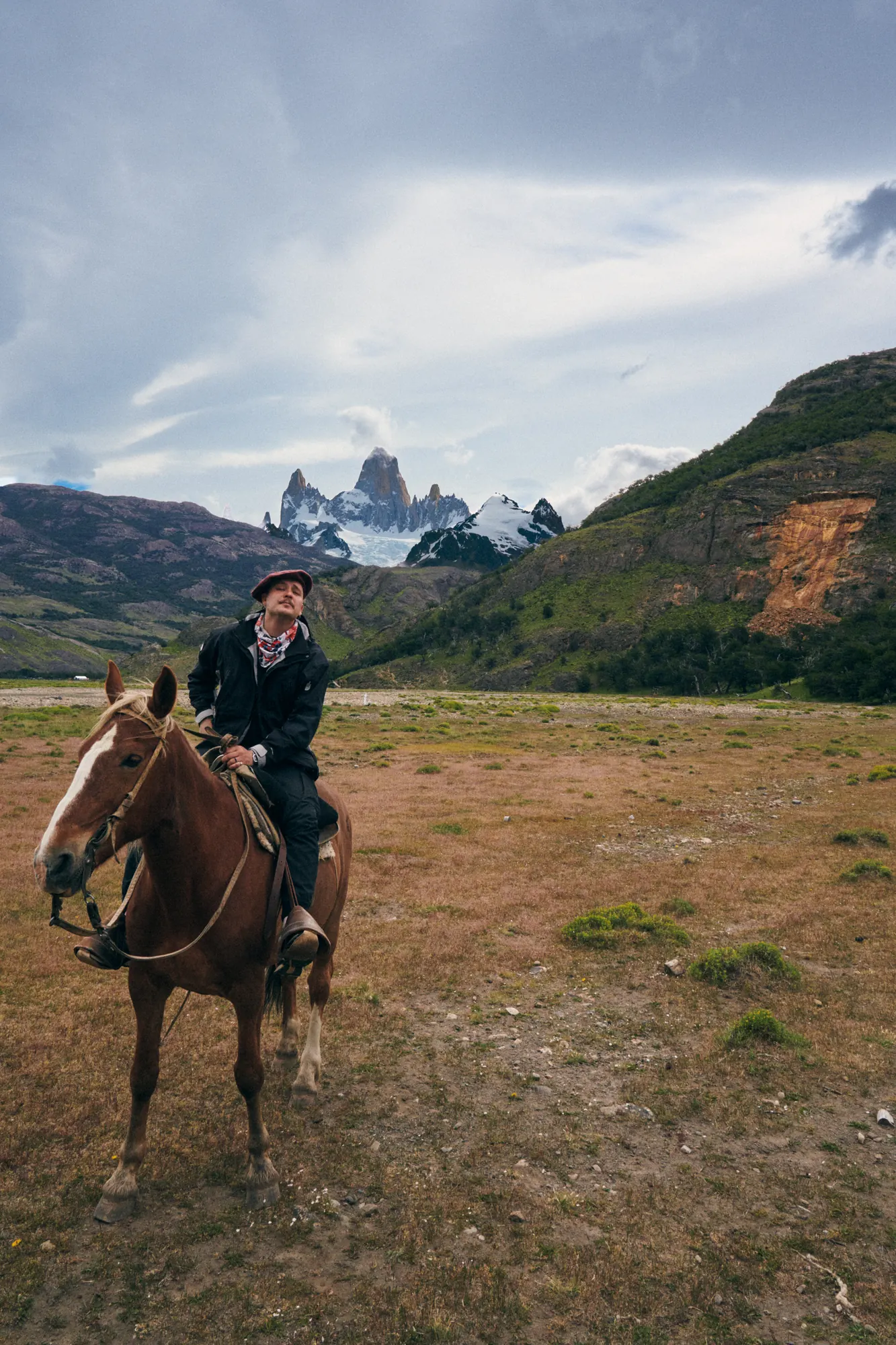 Rider on horseback with Fitz Roy in the distance, El Chaltén